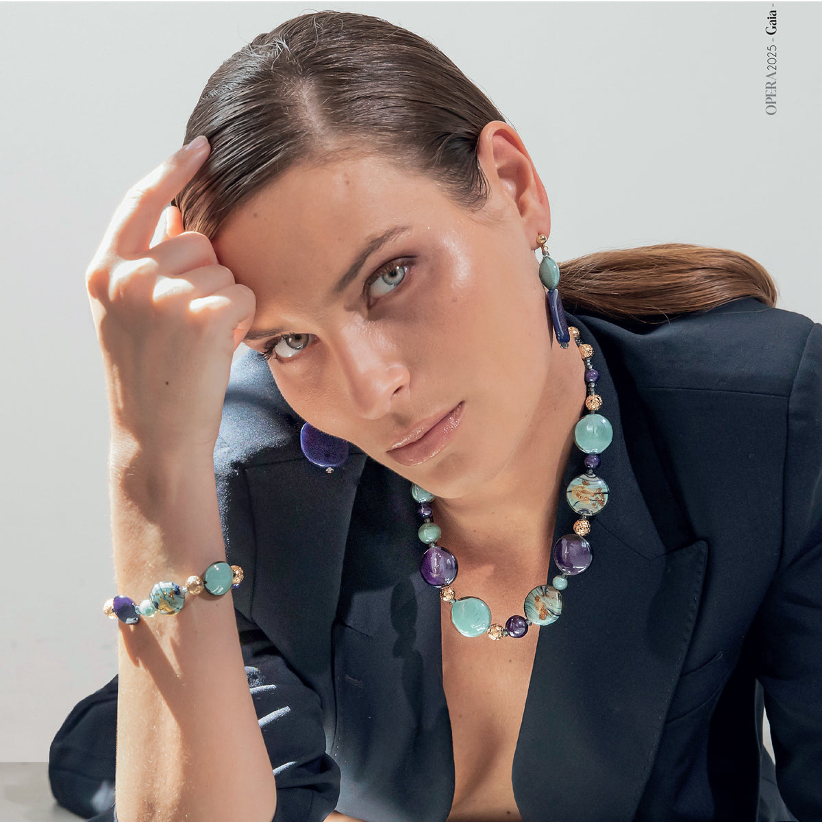 Model wearing colorful Venetian glass necklace from the Gaia Collection by MURRINAMURANO venezia