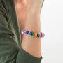 Model wearing MURRINAMURANO Venezia bracelet from the Elettra Collection, handcrafted in Original Murano glass, with Rhodium Finish over Stainless Steel, Made in Italy