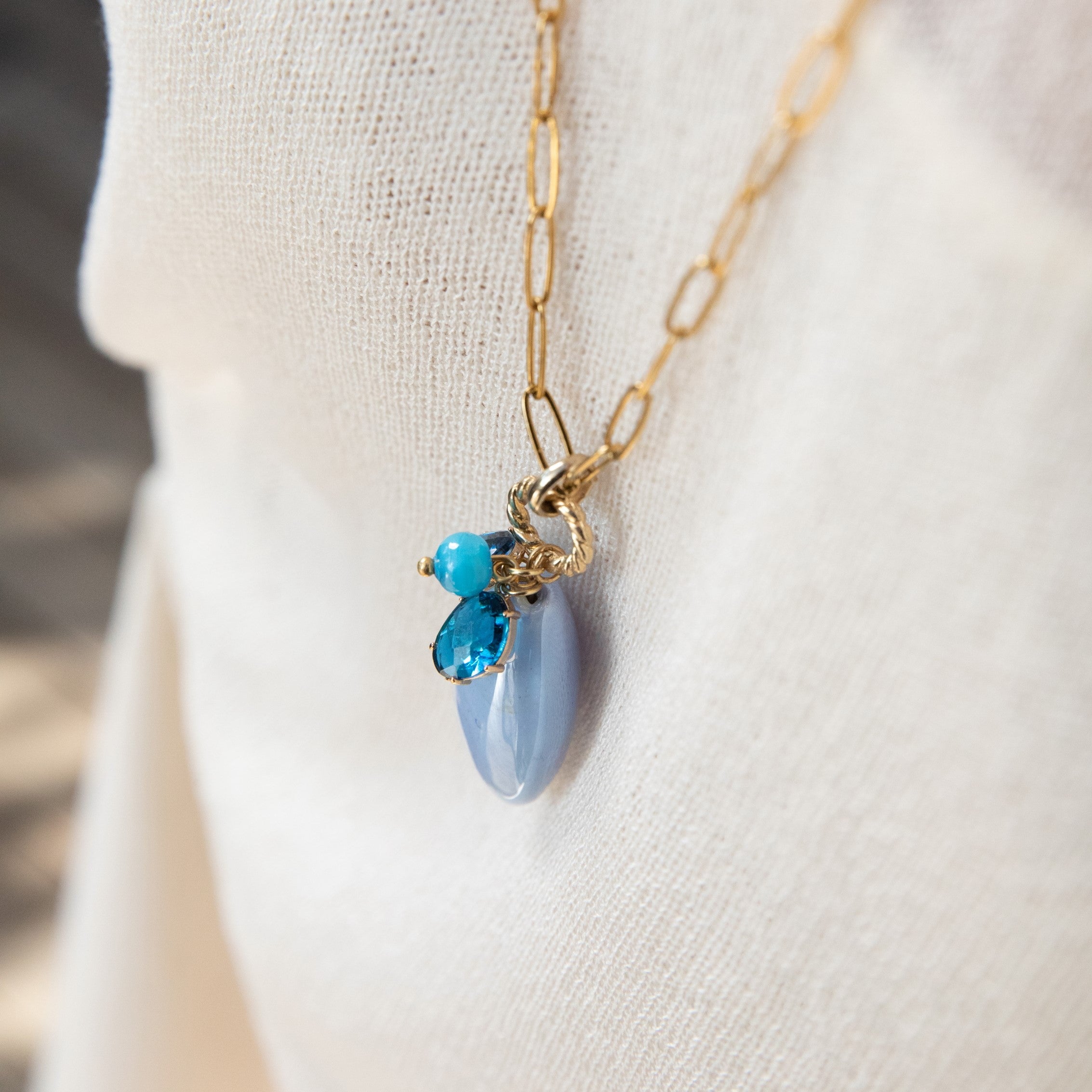 Model wearing MURRINAMURANO Venezia necklace  from the Jasmine Collection, handcrafted in Original Murano glass, 18KT Gold Finish  over Brass with Stainless Steel clasp . Made in Italy – murrinamurano.us