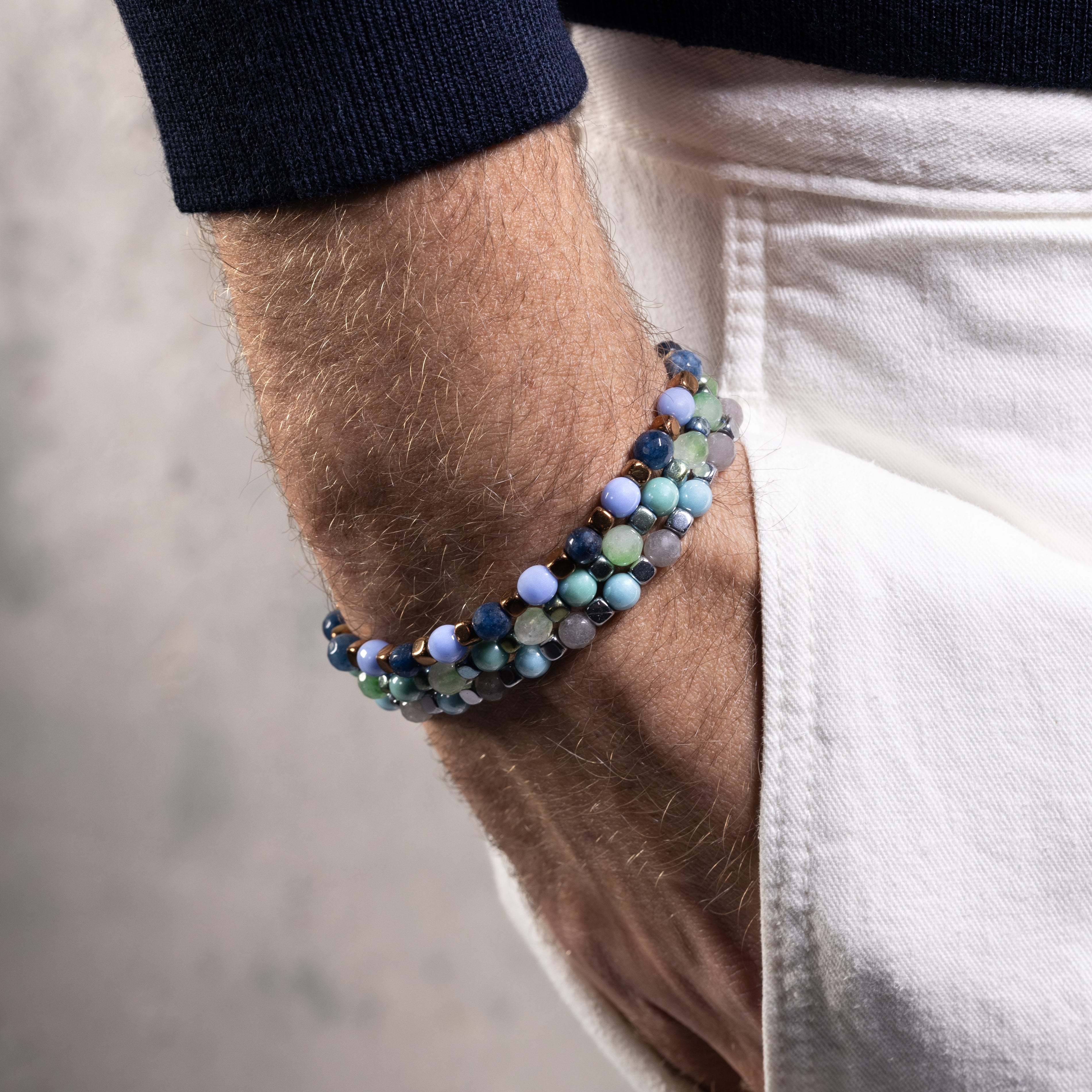 Riesi Collection - Murano Glass Multicolored beaded bracelet on a wrist with a neutral background