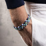 Riesi Collection - Murano Glass Multicolored beaded bracelet on a wrist with a neutral background