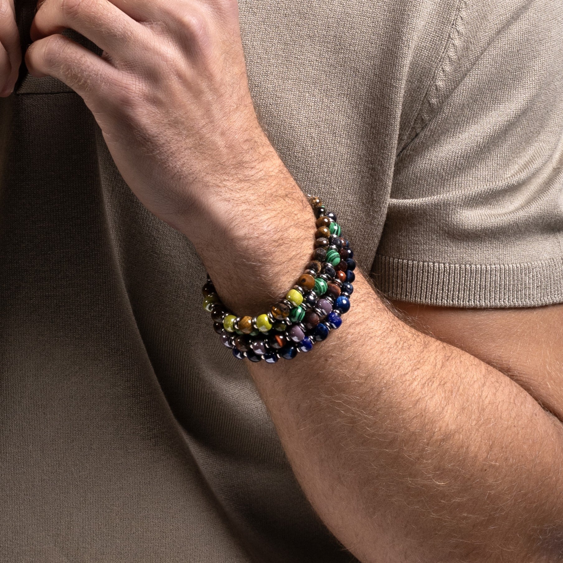 Nobile Collection - Murano Glass Multicolored beaded bracelet on a person's wrist with a neutral background