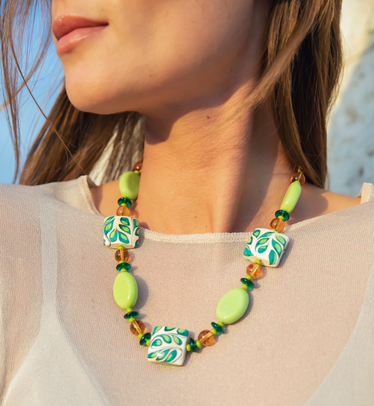 Model wearing Murano glass jewelry