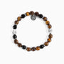 Batista men's bracelet with tiger eye, malachite and glass beads, rhodium finish over stainless steel and brass, adjustable stretch fit, contemporary Italian design — angled view.