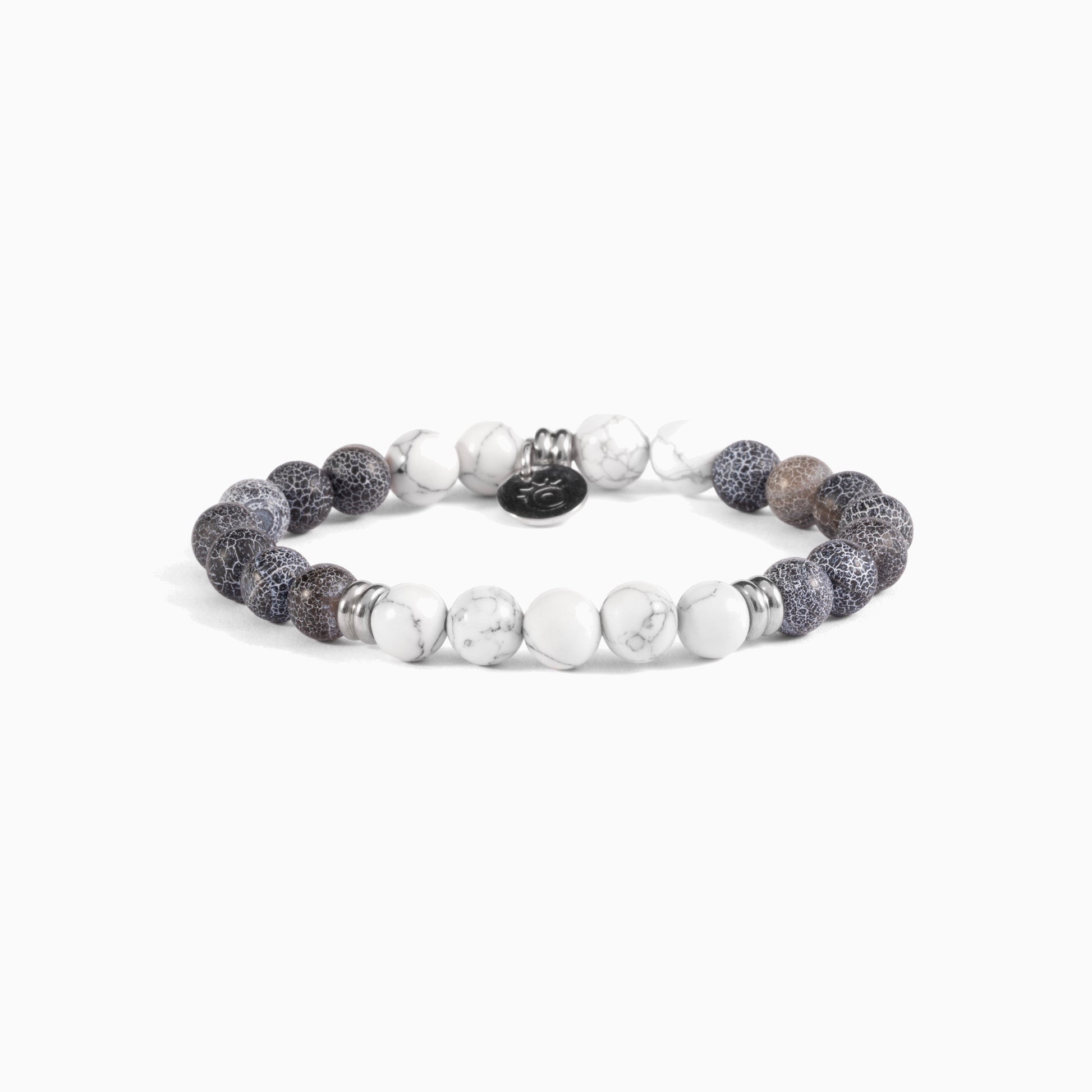 Etna Collection men's bracelet with lava stone and agate beads, stainless steel and brass accents, adjustable fit, contemporary Italian design — side view.