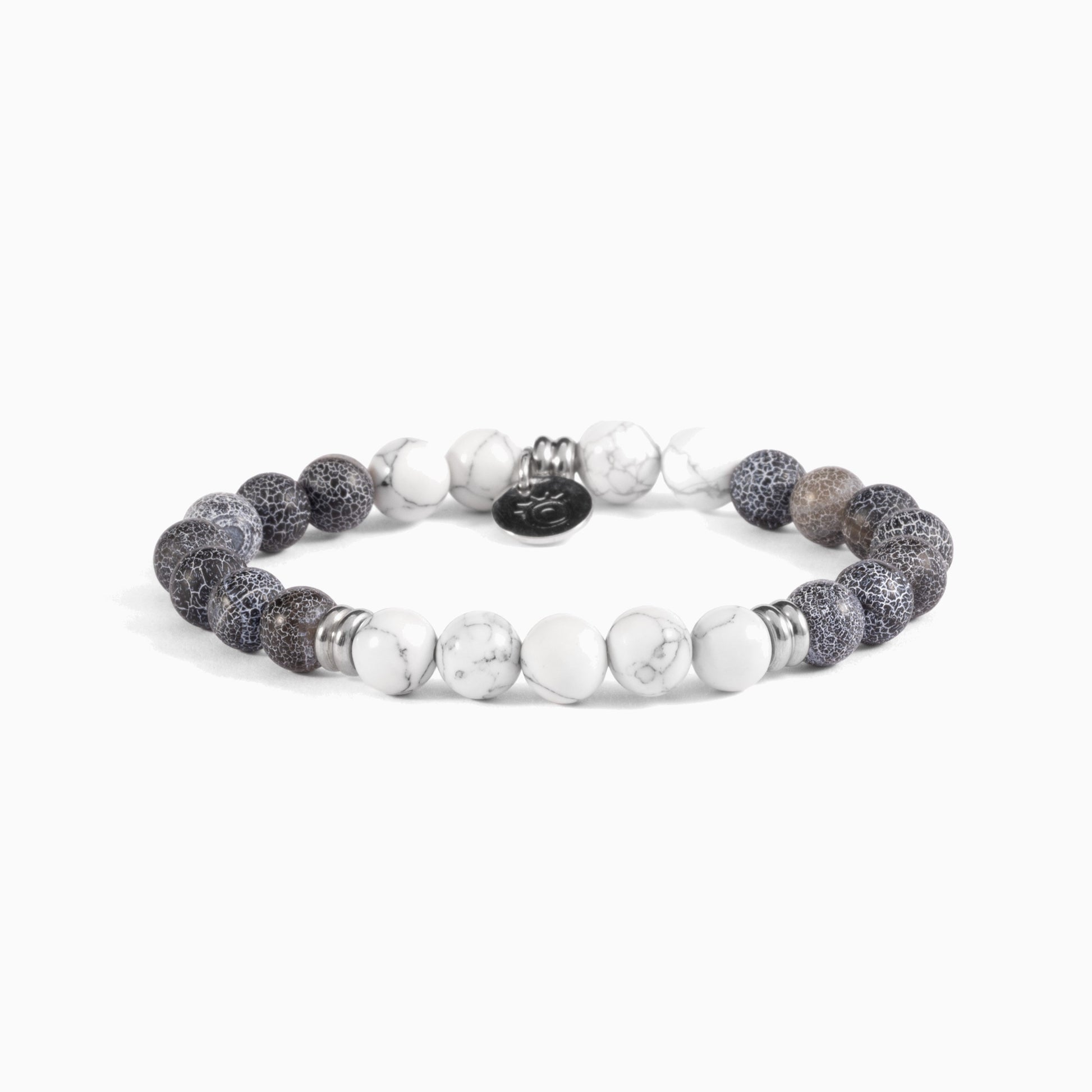 Etna Collection men's bracelet with lava stone and agate beads, stainless steel and brass accents, adjustable fit, contemporary Italian design — close-up.