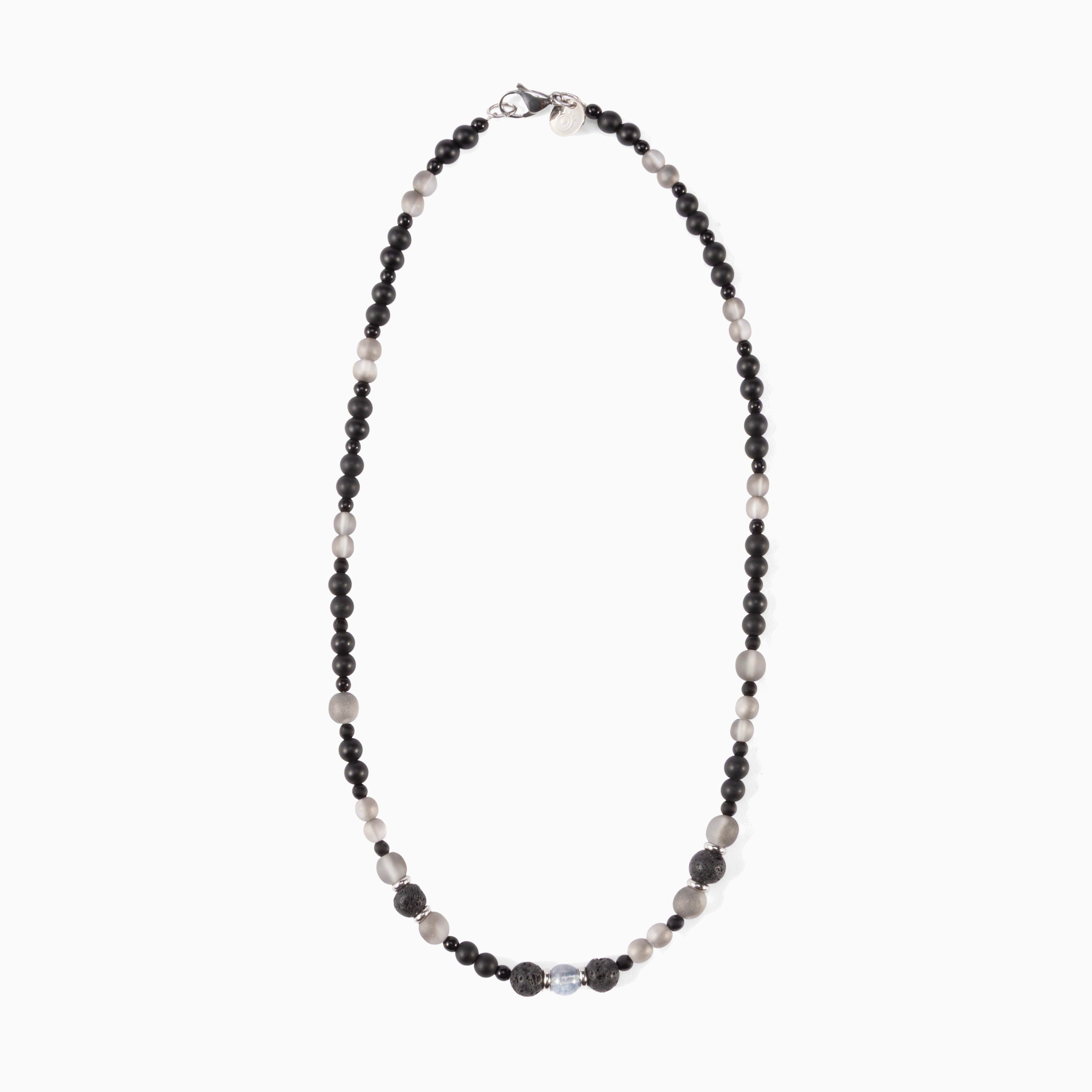 Glera Collection men's necklace with lava stone beads and rhodium finish over stainless steel and brass, 50 cm length — detail of the lava stone beads.