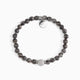 Koko Collection - Bracelet with brown beads and a grey accent bead on a white background