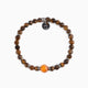 Koko Collection - Brown beaded bracelet with a silver charm on a white background