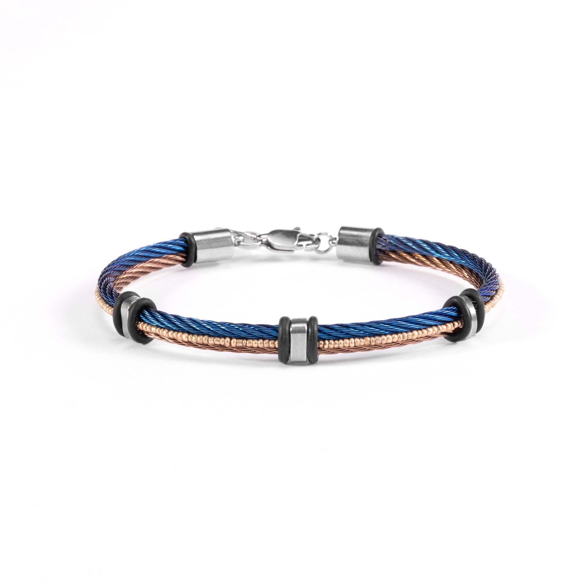 Split men's bracelet — stainless steel cable with blue and brown braided cord, contemporary industrial design, on a white background.