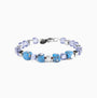 Flux Collection men's bracelet with ceramic cubes, hematite beads and rhodium finish over stainless steel and brass, 20 cm length — angled view.