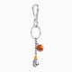 Dusk Collection men’s keychain with lava stone bead, stainless steel hardware and brass accent, 13 cm length, skull detail.