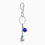 Dusk Collection men's keychain with lava stone bead, stainless steel hardware and brass accent, 13 cm length, skull detail — detail view.