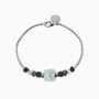 Weld Collection — Murano glass and lava stone men's bracelet with beads on a white background, angled view.
