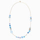Close-up of the Glow Murano glass opera necklace showing the beadwork and 18KT gold-finish chain.