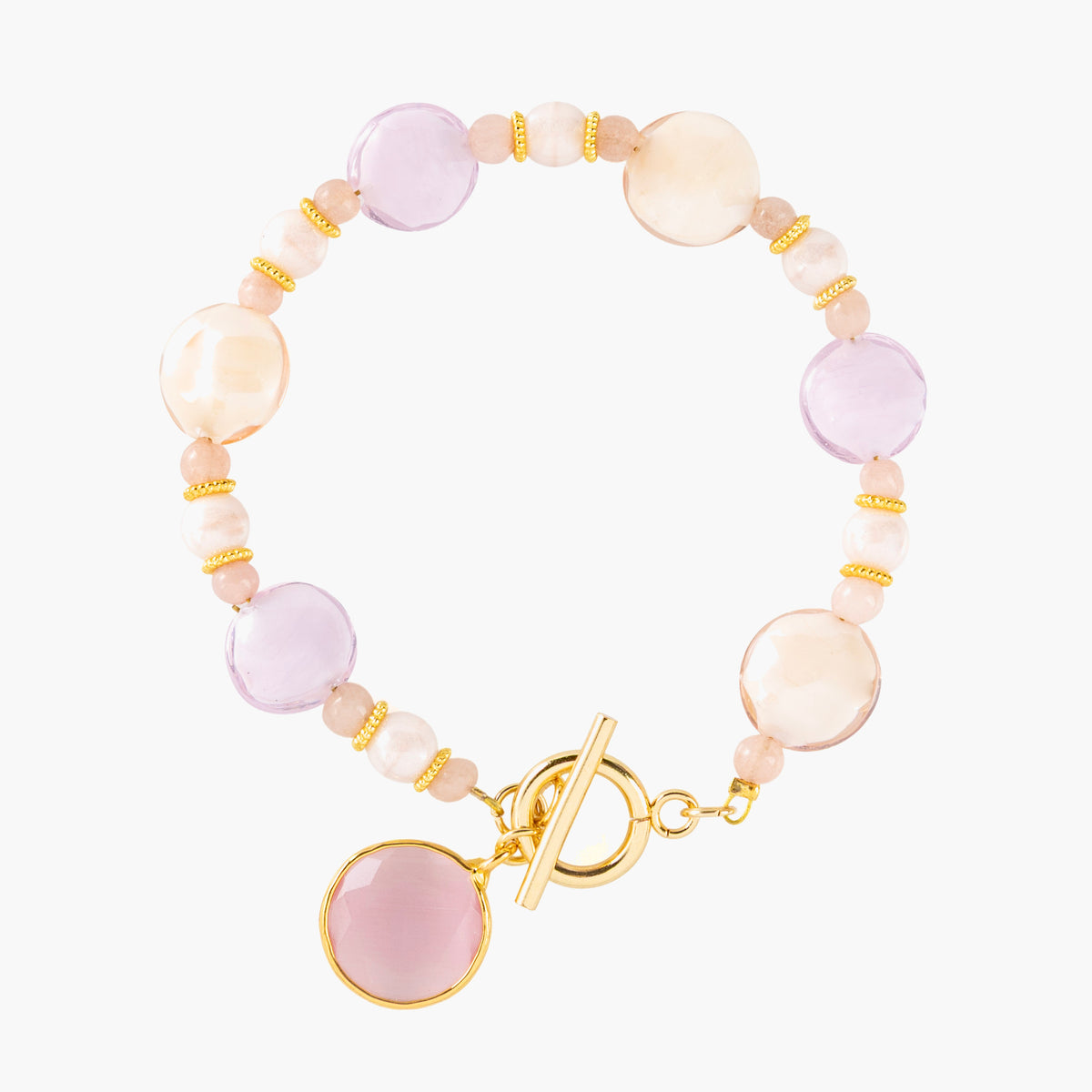 MurrinaMurano.us pink Trace Bracelet with pale pink Murano Glass, peach-toned stone accents, gold-finished spacers, and a faceted pink glass pendant. Handcrafted in Italy.