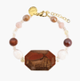MurrinaMurano.us brown Frame Bracelet combining warm amber and cream Murano Glass with a large faceted brown centerpiece and polished gold-finished accents. Handcrafted in Italy.
