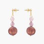 MurrinaMurano.us Frame drop earrings in soft pink Murano Glass, combining delicate pink and rose-toned beads with large luminous glass drops and polished gold-finished details. Handcrafted in Italy.