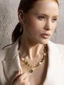 MurrinaMurano.us model wearing the green Trace Choker Necklace with rounded Murano Glass beads, pale stone accents, and a distinctive gold-toned toggle clasp. Handcrafted in Italy.