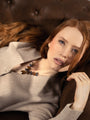 MurrinaMurano.us model wearing Core Top Drop Earrings with warm amber-brown Murano Glass and faceted champagne crystal drops, showcasing the layered drop silhouette. Handcrafted in Italy.