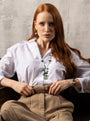 Model wearing a Core Link Bracelet in green Murano Glass with 18KT gold-finished details. Handcrafted in Italy.