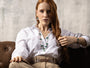 MurrinaMurano.us model wearing Core Murano Glass Drop Earrings in green and white, styled with 18KT gold-finished details. Handcrafted in Italy.