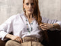 MurrinaMurano.us model wearing a Core Long Necklace in green and white Murano Glass with a faceted natural stone pendant and 18KT gold-finished details. Handcrafted in Italy.