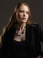 “MurrinaMurano.us model wearing Frame drop earrings in soft pink Murano Glass, with delicate lilac-toned glass beads and rounded rose-colored accents creating an elegant elongated silhouette. Handcrafted in Italy.