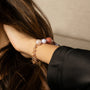Model wearing MURRINAMURANO Venezia Bracelet from the Bubble Collection, handcrafted in authentic Murano glass, 18KT Gold Finish or Rhodium finish, over Brass. Made in Italy – murrinamurano.us