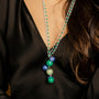 Model wearing MURRINAMURANO Venezia Necklace from the Bubble Collection, handcrafted in authentic Murano glass, Rhodium finish over Brass. Made in Italy – murrinamurano.us