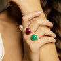 Model wearing MURRINAMURANO Venezia Rings from the Drop Collection, handcrafted in authentic Murano glass, Rhodium finish over Brass. Made in Italy – murrinamurano.us