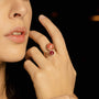 Model wearing MURRINAMURANO Venezia Ring from the Drop Collection, handcrafted in authentic Murano glass, 18KT Gold Finish over Brass. Made in Italy – murrinamurano.us