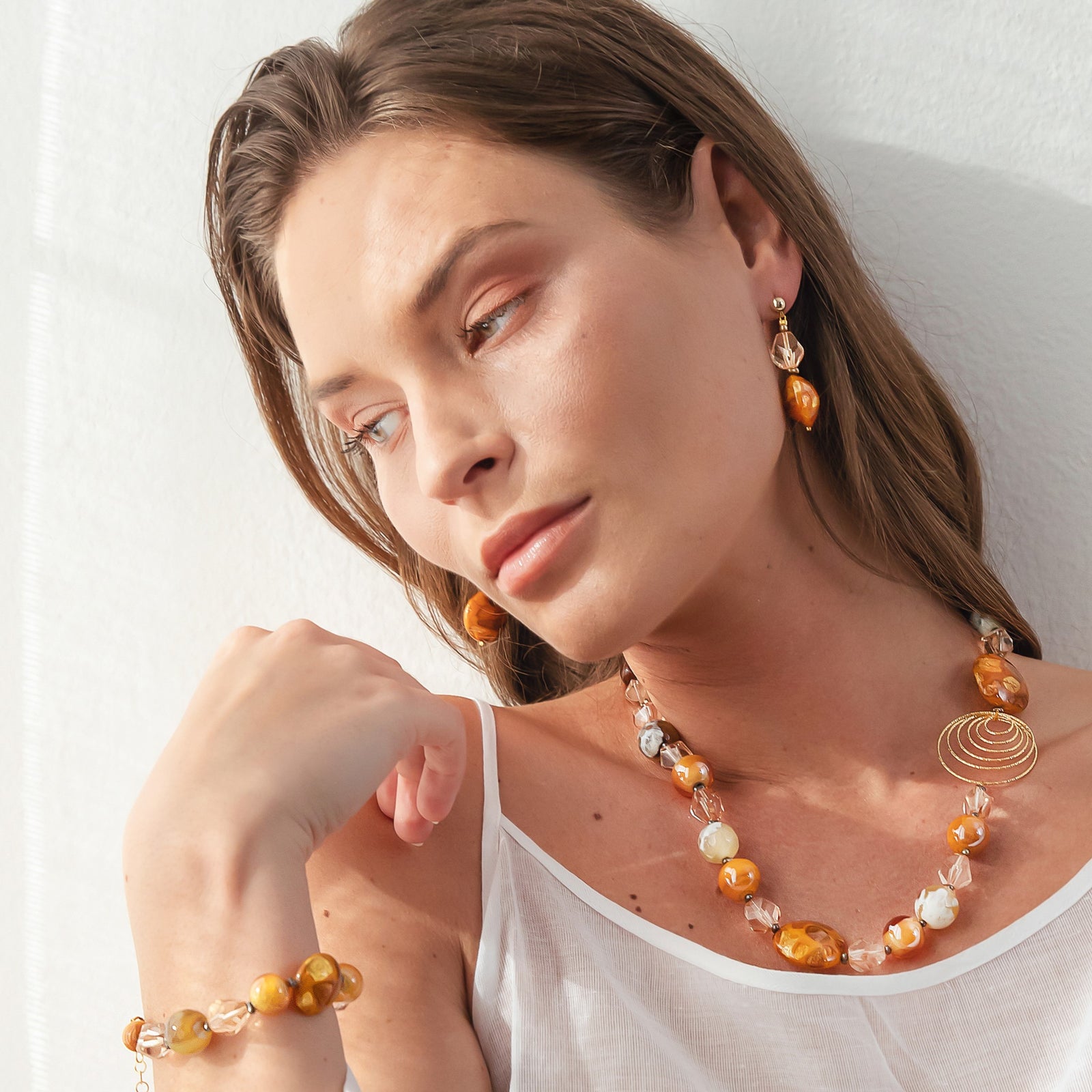 Model wearing Murano glass jewelry