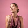 MurrinaMurano.us Blush Collection bracelet with pink and ivory Murano glass beads and gold detailing, worn by a model.