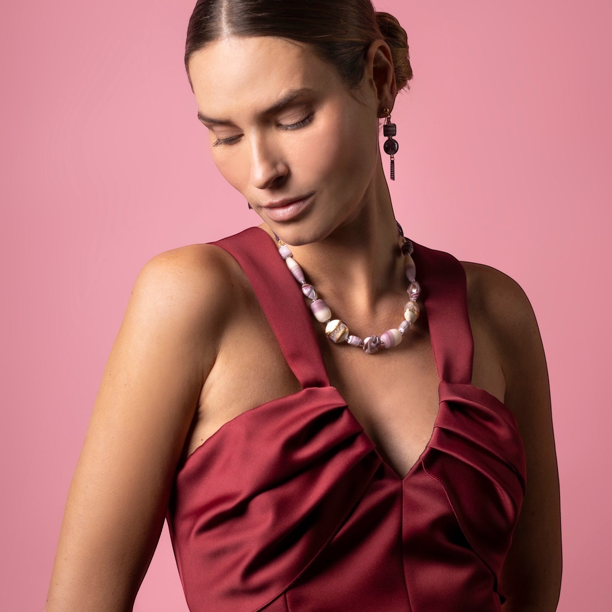 MurrinaMurano.us Blush Collection Murano glass collier necklace with purple and white beads on a model wearing a maroon dress.