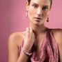MurrinaMurano.us Blush Collection drop earrings with pink and amber Murano glass beads, 18KT gold finish. Model wears matching bracelet.