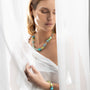 MurrinaMurano.us Evoque bracelet with turquoise, green, and clear Murano glass beads and gold-tone accents.