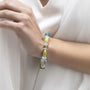 MurrinaMurano.us Evoque bracelet with Murano glass beads in pastel green, yellow, and blue, accented with gold-plated brass. Contemporary design.