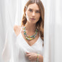 MurrinaMurano.us Evoque Collection double strand Murano glass necklace in blue and green hues with gold-finish brass accents.