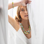 MurrinaMurano.us Evoque Collection double strand Murano glass necklace with 18KT gold finish brass elements. Pastel green, blue, and yellow beads.