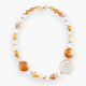 MurrinaMurano.us Aura Necklace Gold Spiral, featuring amber and clear Murano glass beads with gold accents and a spiral pendant.