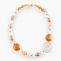 MurrinaMurano.us Aura Necklace Gold Spiral, featuring amber and clear Murano glass beads with gold accents and a spiral pendant.