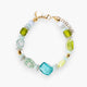 MurrinaMurano.us Evoque bracelet with mixed glass beads in blue, green, and gold, featuring an 18kt gold finish over brass clasp and charm.