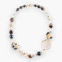 MurrinaMurano.us gold spiral necklace with black, white, and brown Murano glass beads and gold accents.